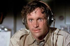 The pilot in airplane sweating up a storm;