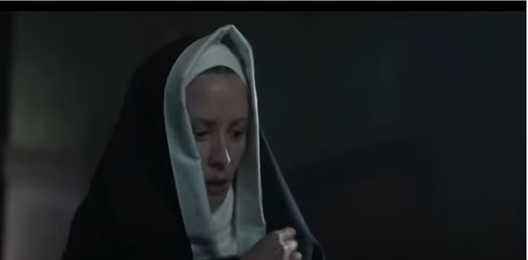Nun on Chucky 2 Series doing the cross across her chest