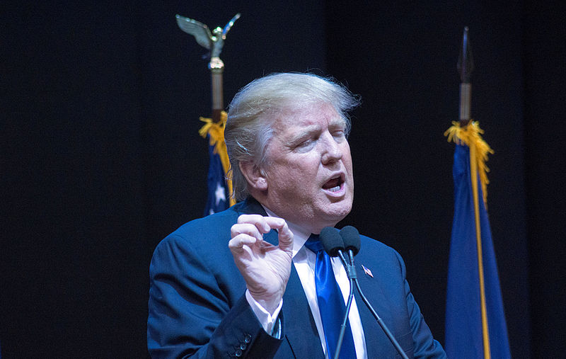 Donald Trump gesturing with his hand;