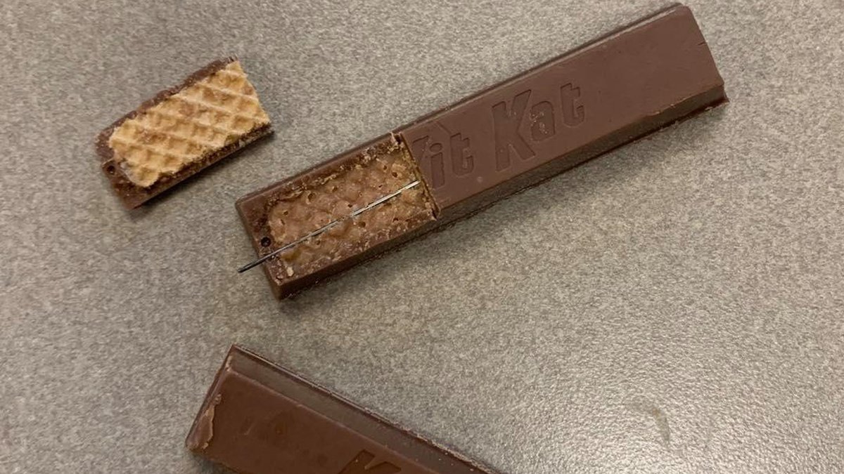 Sewing needle in a Kit Kat candy bar;