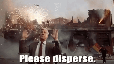 Naked Gun Leslie Nielsen telling everyone not to panic while the building is burning down;