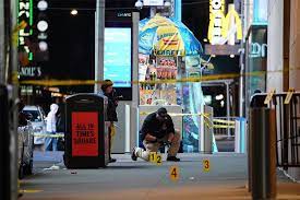 A man shot three female bystanders in Times Square;