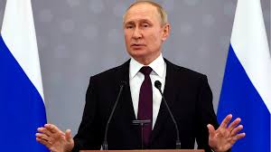 Russian President Vladimir (Poochie Pooh) Putin looking like he's denying something;